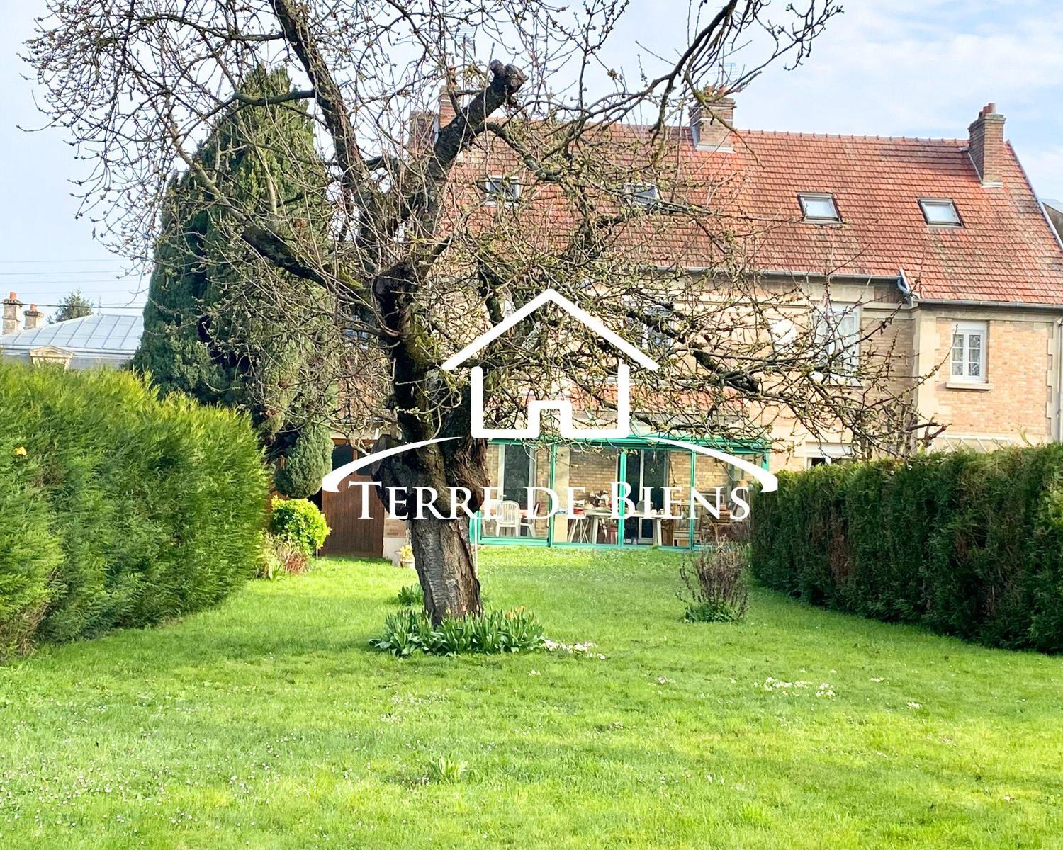 Maison 5/6 pièces, grande pièce de vie traversante, avec véranda et beau jardin dans Soissons